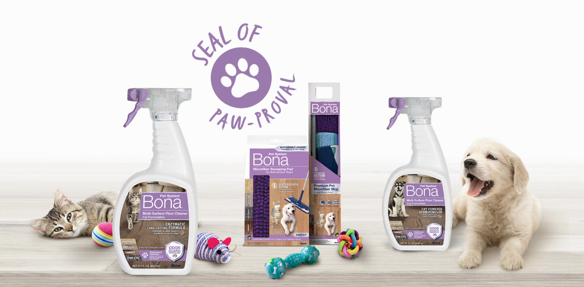 At left, a sleepy kitten in repose looks toward center with Bona Pet System products and a lab puppy looks on from the right.