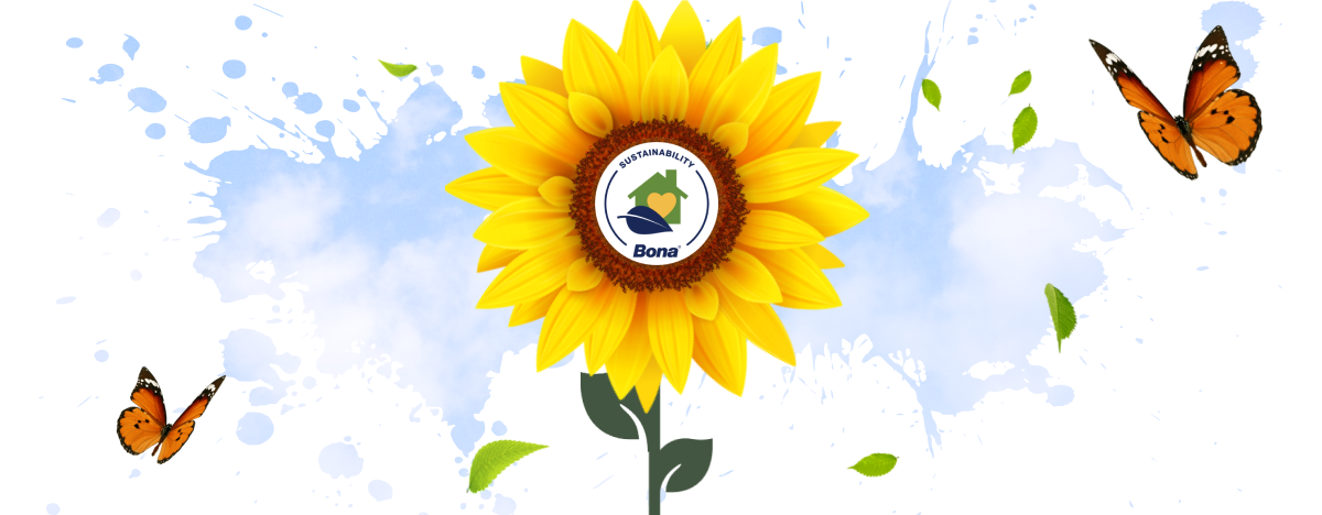A bright image of a sunflower with the Sustainability seal in the center, swirling butterflies, and a blue sky background.