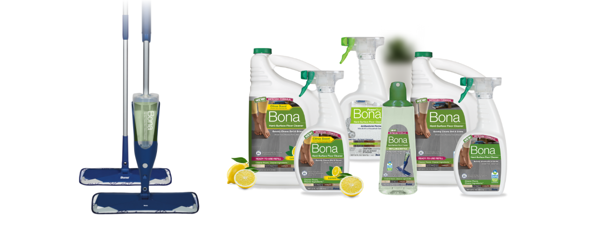 Two blue Bona spray mops with cleaners and several Bona Hard-Surface Floor Cleaners placed beside lemons.